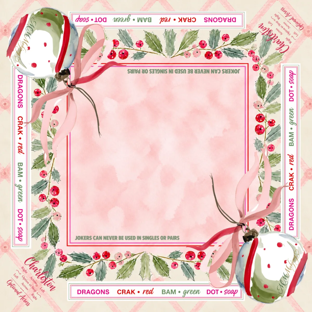 The Noel Collection mat: a 33-inch square pink watercolor playing surface bordered with holly, berries and ribboned ornaments, printed with the suit names (dragons, crak, bam, dot, soap) on all four sides.